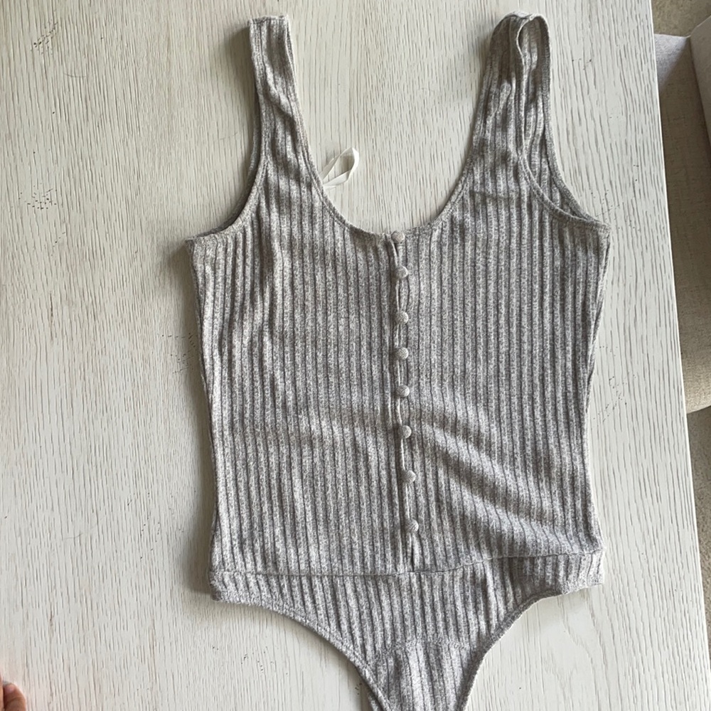 Grey body suit
